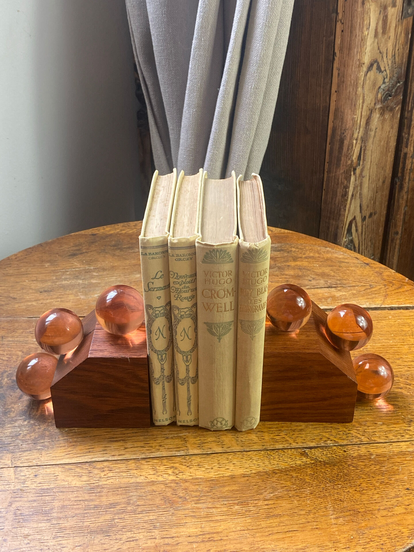 Wooden bookends and spherical glass balls
