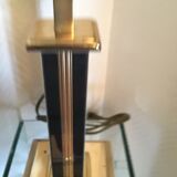 Black and gold lamp marks the Daophin