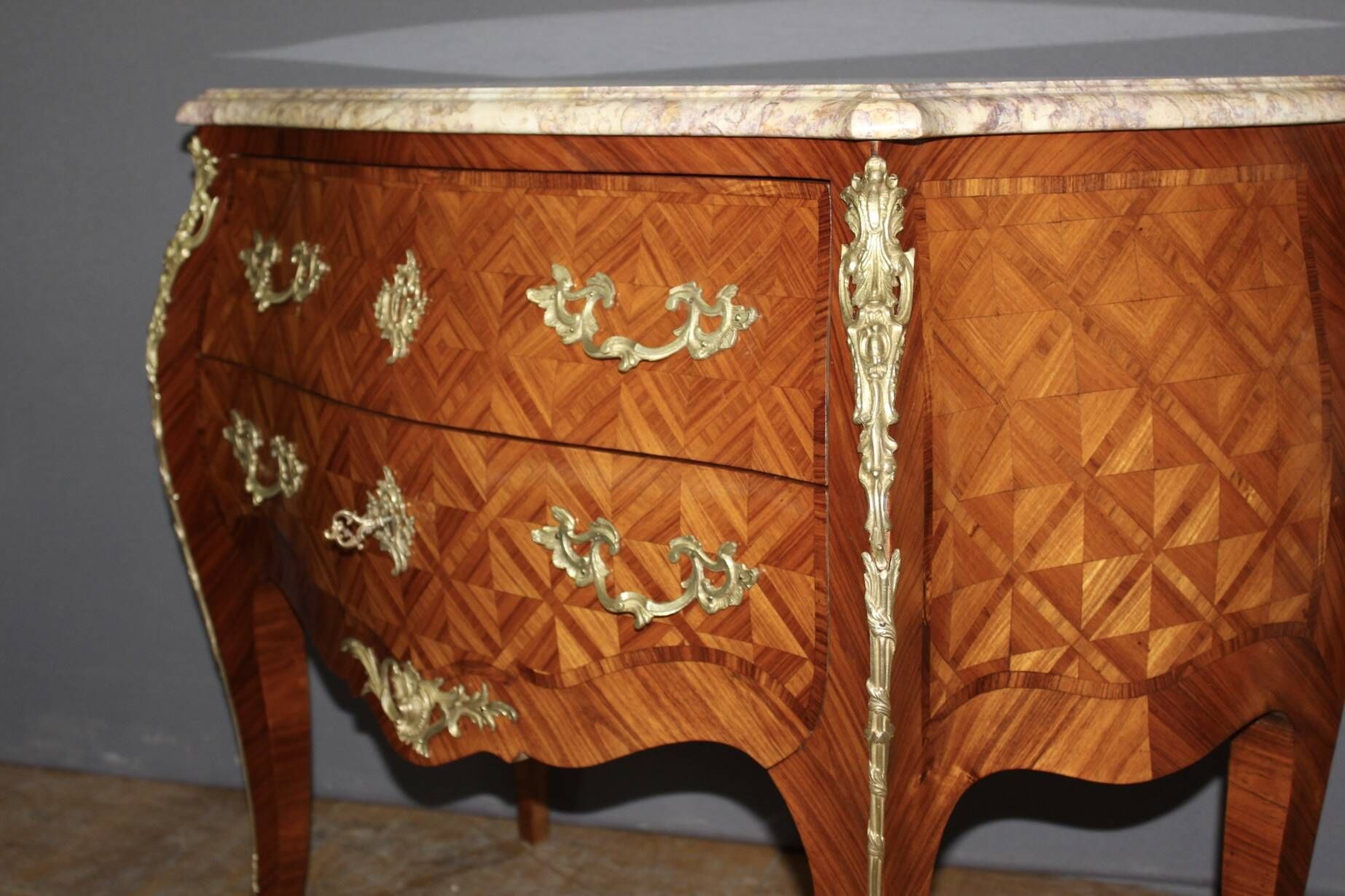 Louis XV commode in marquetry