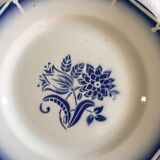 Together seven dessert plates mismatched in blue.