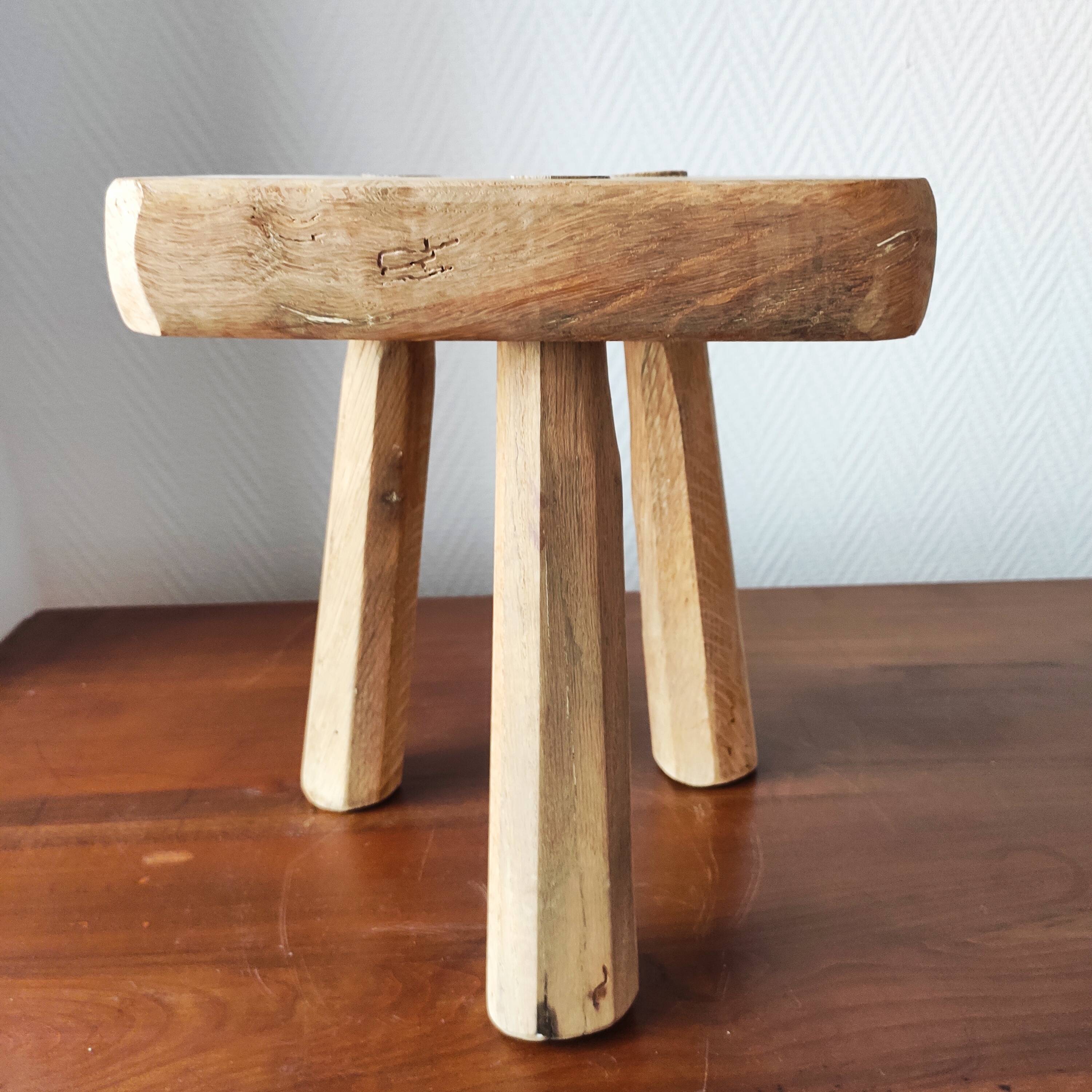 Vintage Danish brutalist tripod stool made of solid oak.