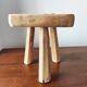 Vintage Danish brutalist tripod stool made of solid oak.