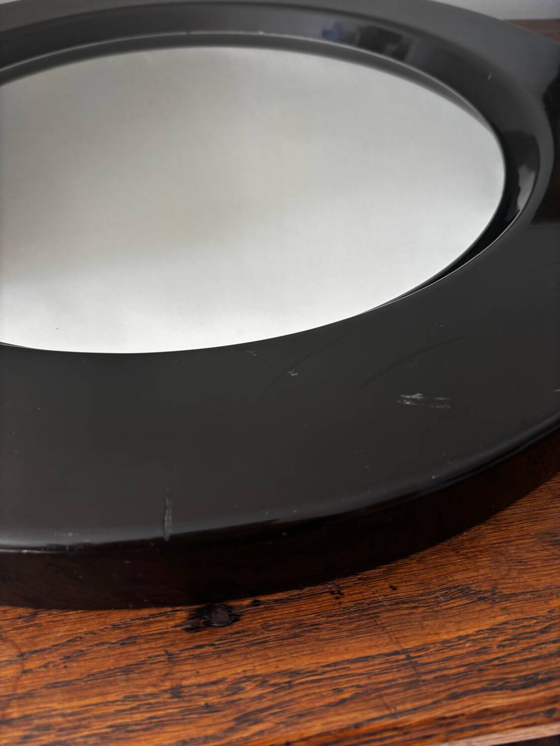 Vintage round mirror from the 70s, smoked brown plastic