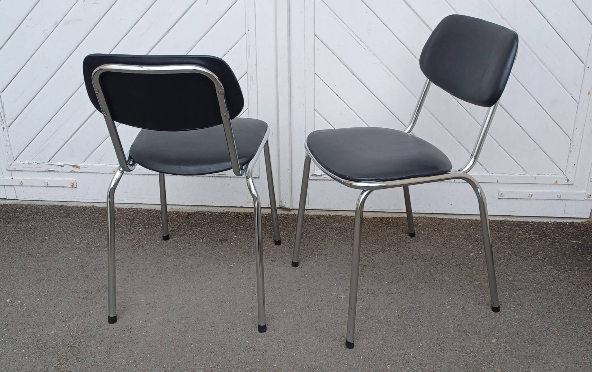 Pair of vintage faux leather and chrome chairs