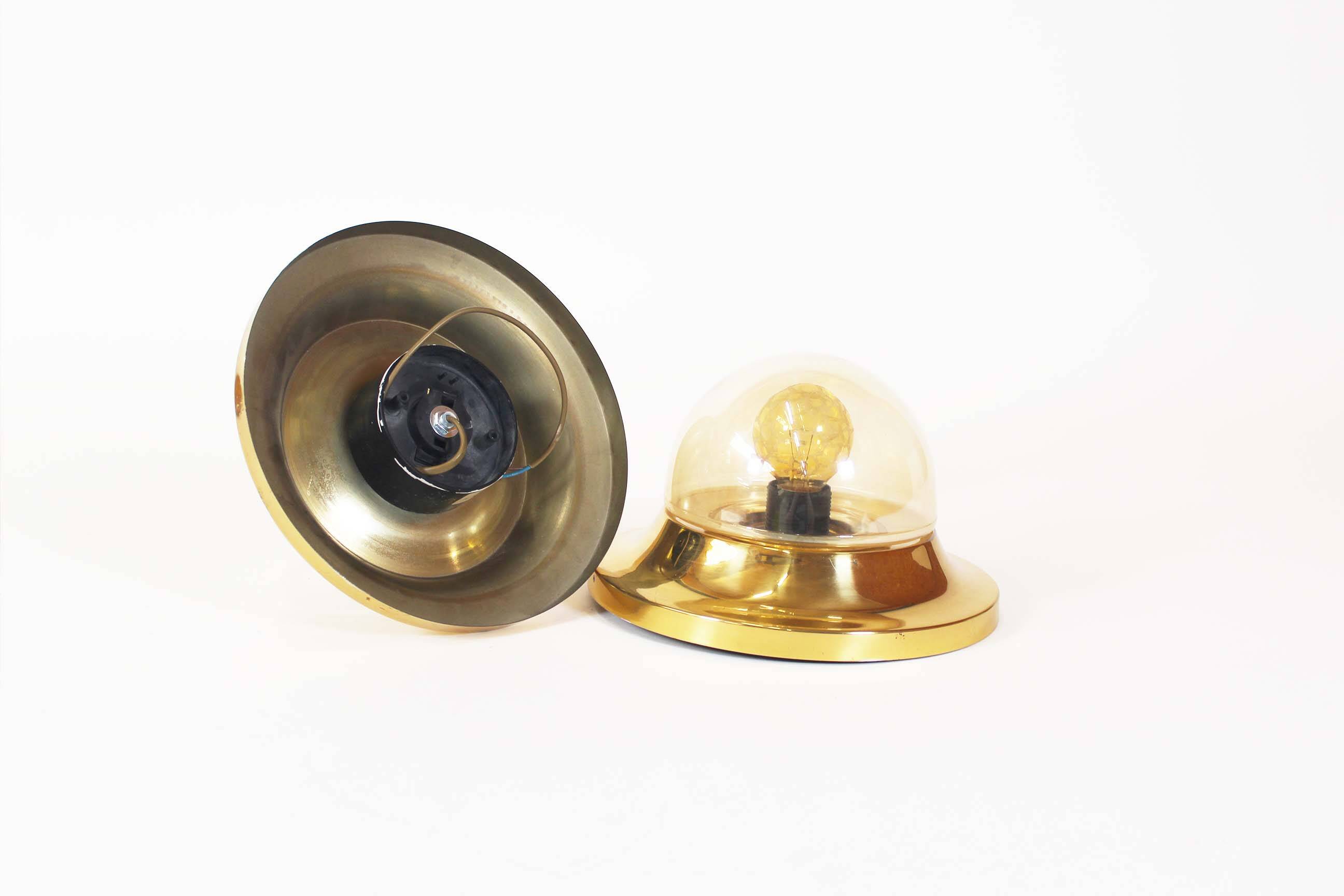 Pair of 1970’s petite brass & glass wall lights