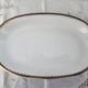 Grand plat ovale porcelaine Winterling Bavaria décor frise dorée Excelsior