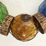 Fishing floats made of blown glass, cork, and rope. France, 1960s.