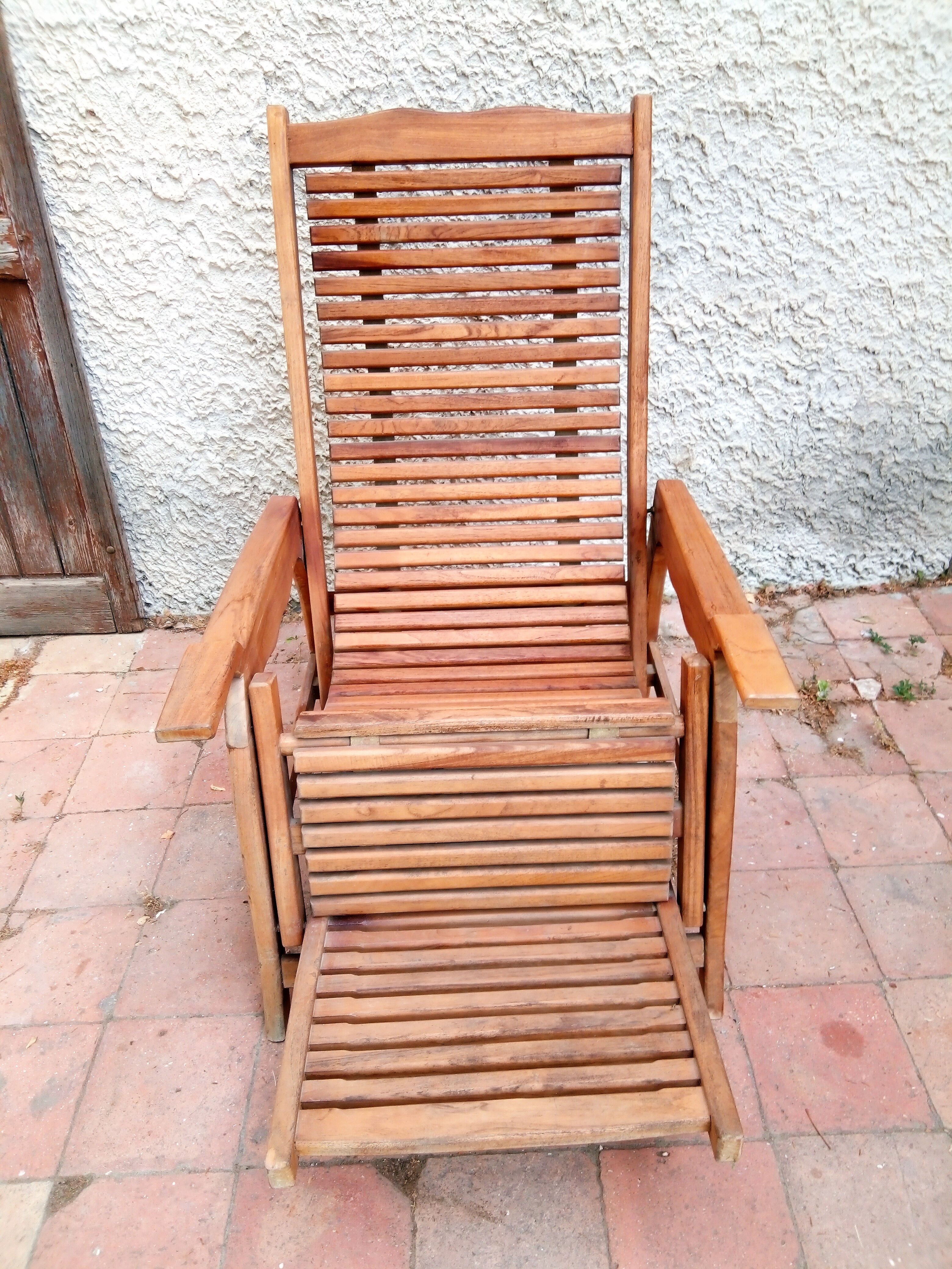 Teak stretchy long chair.
