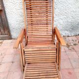 Teak stretchy long chair.