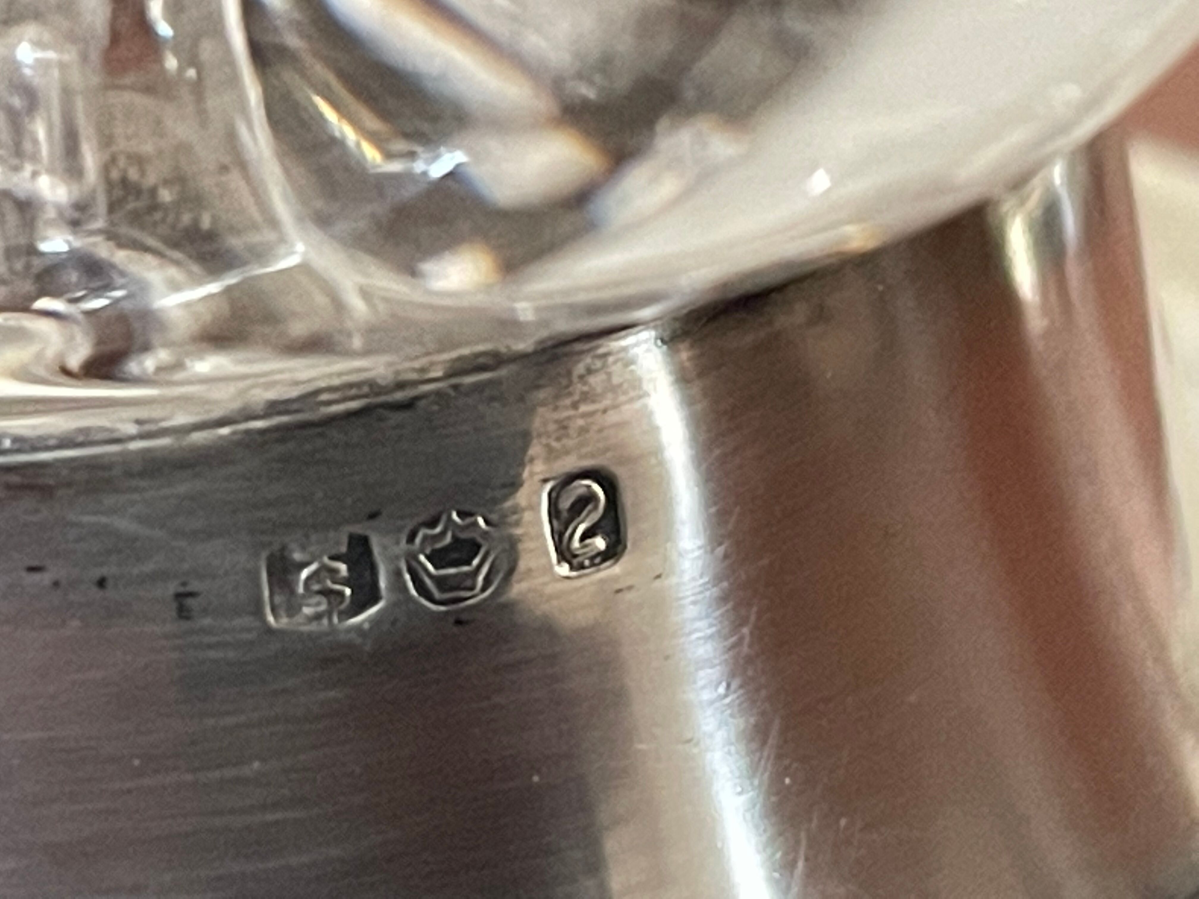 Pair of candle holders in crystal and vintage silver metal