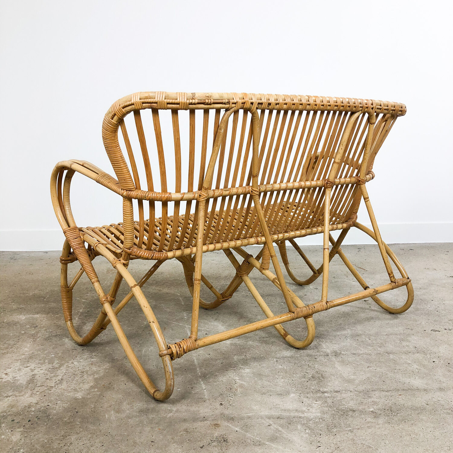 Vintage rattan two seater sofa by Rohe Noordwolde