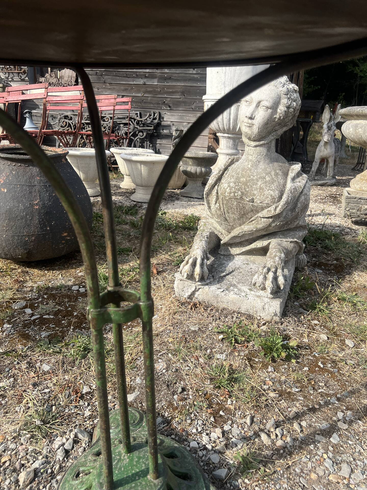 Garden table with a cast iron base