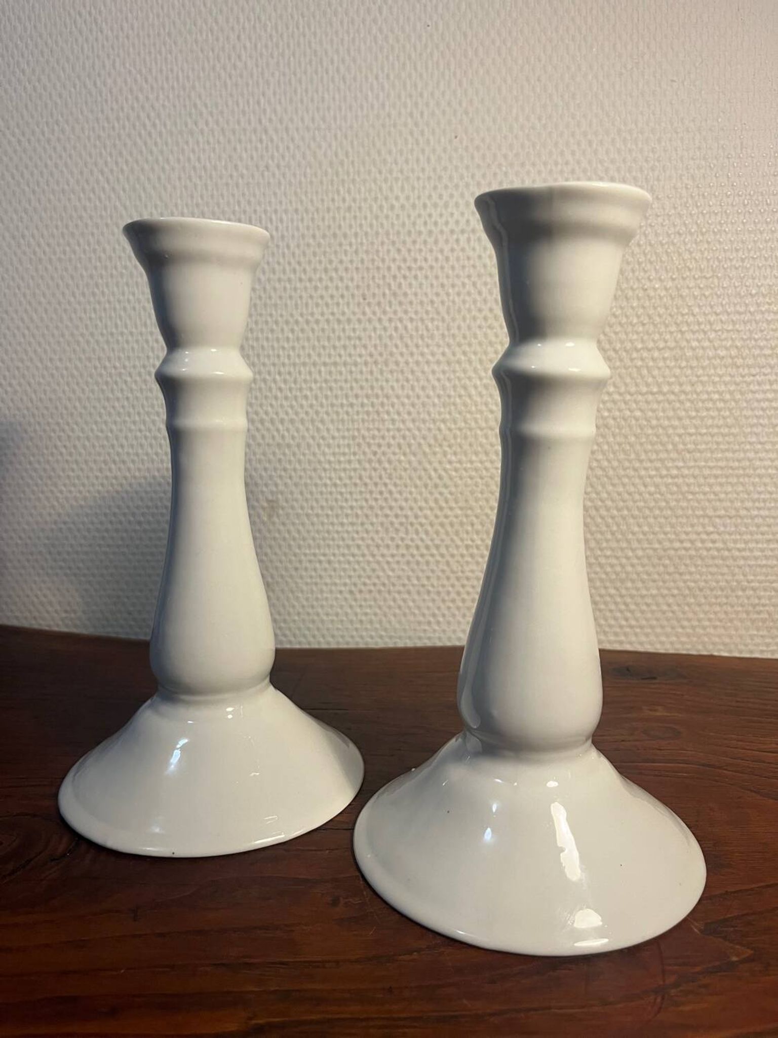 Duo pair of earthenware candlesticks by Maison Huet