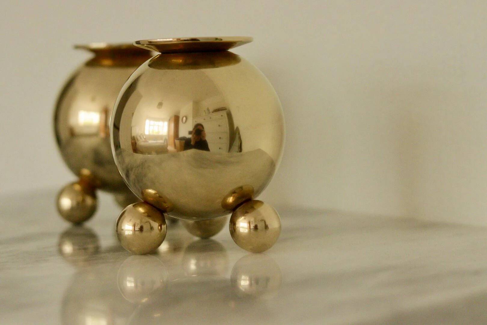 Pair of mid-century Swedish heavy brass candle holders