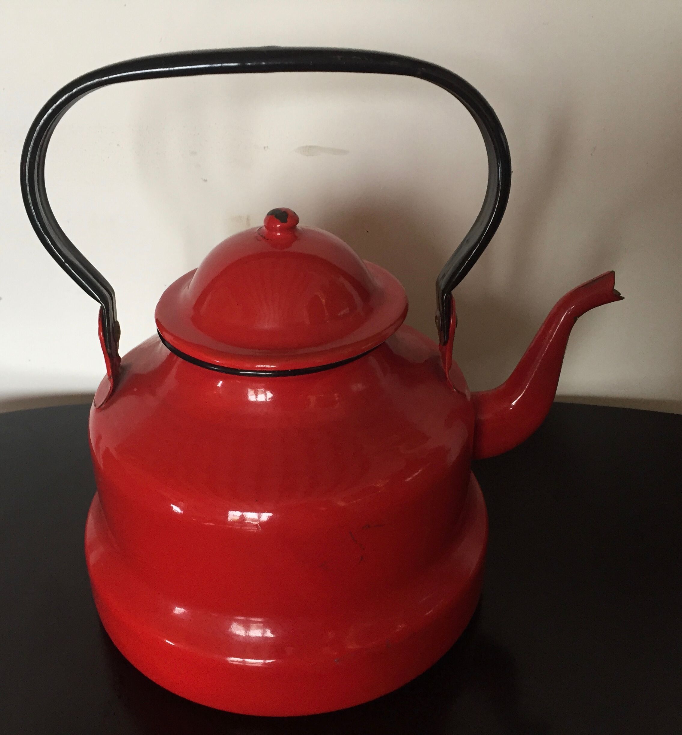 Red enamelled kettle