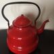 Red enamelled kettle