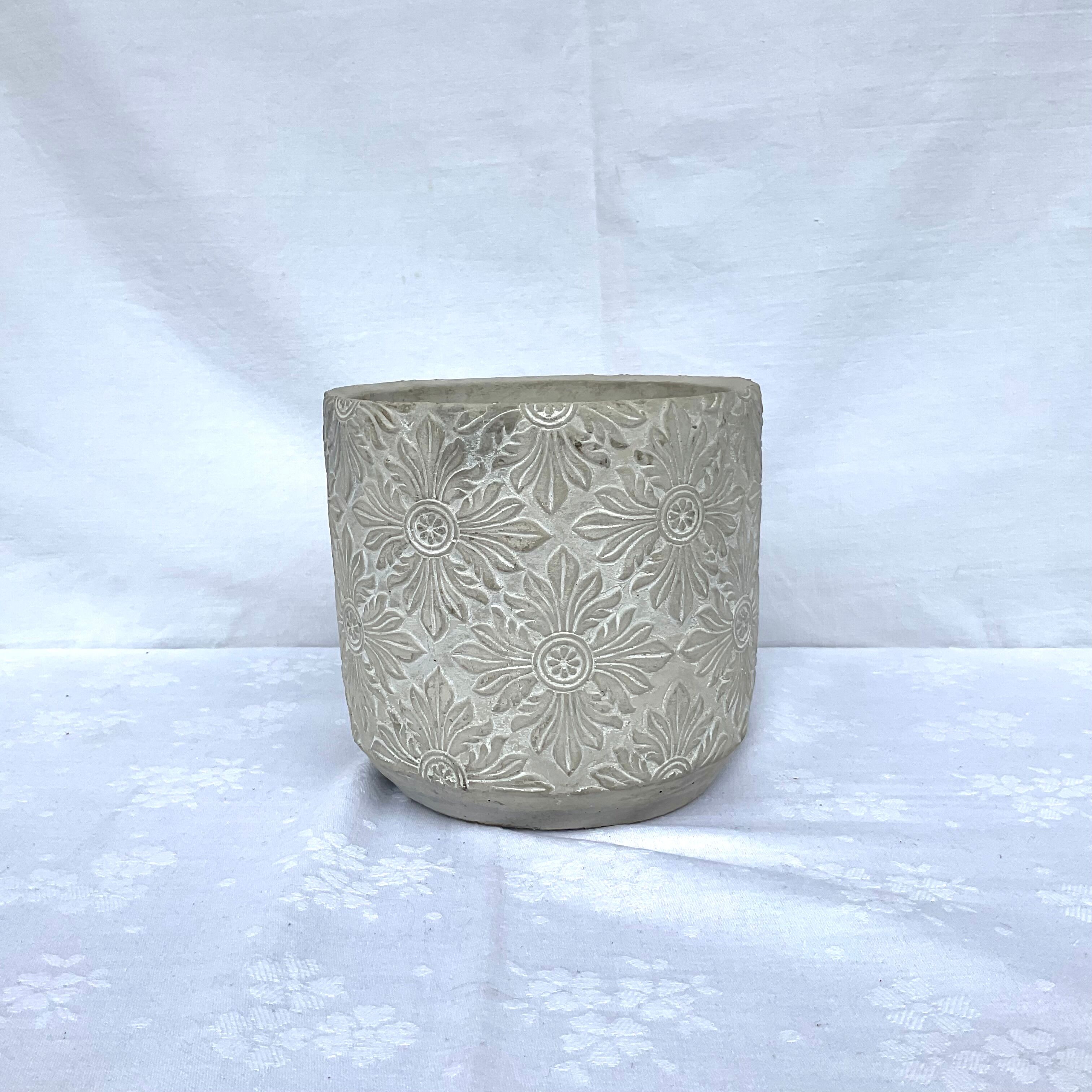 Cache-pot gray decoration in relief
