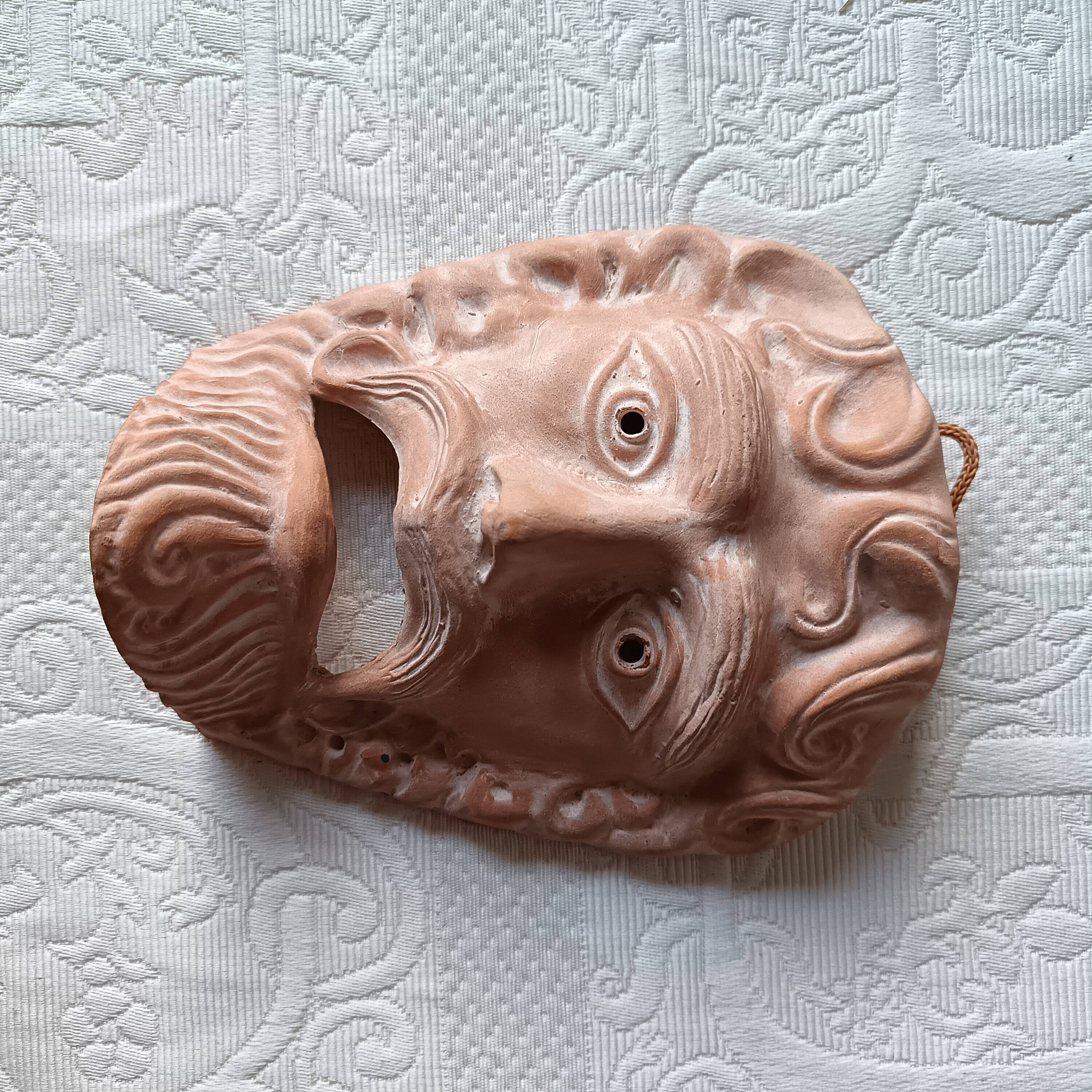 2 vintage terracotta masks made in Greece