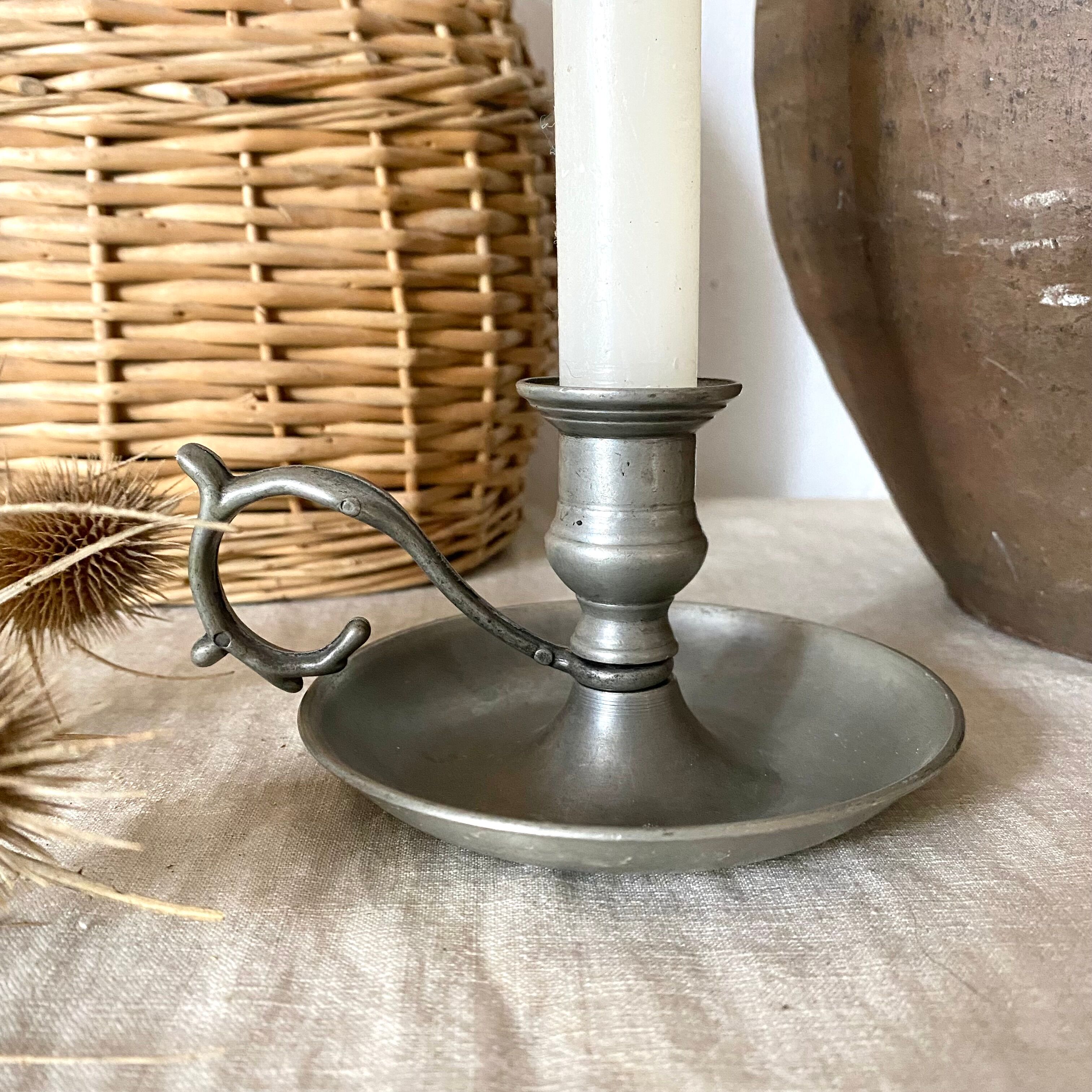Tin thumb candle holder