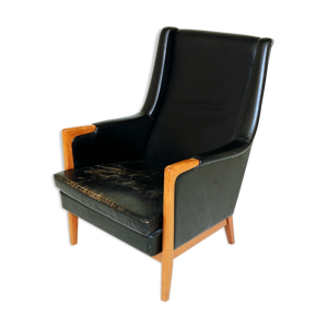 Fauteuil en cuir patiné,