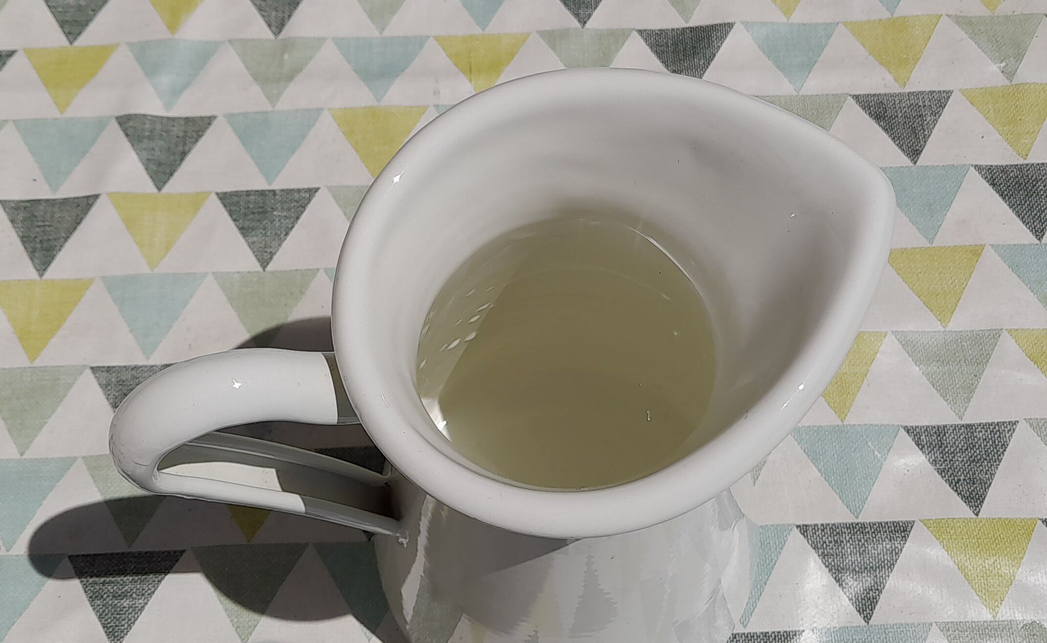 Broc in white enamelled sheet metal