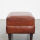 Pouf en cuir de mouton couleur cognac