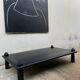 Table basse bois teinté noir brutaliste