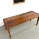 Farm table in walnut with spindle legs.