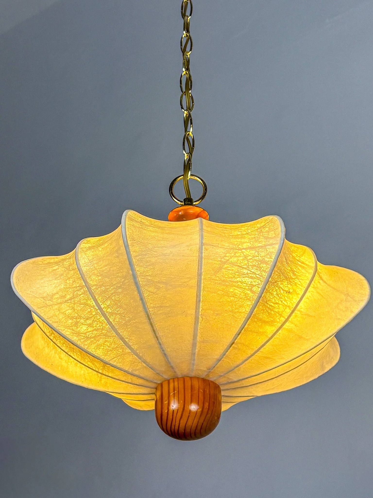 1960s Italian cocoon suspension, made of resin and pine wood.