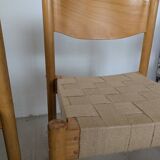 Set of 6 stackable chairs in beech and jute.
