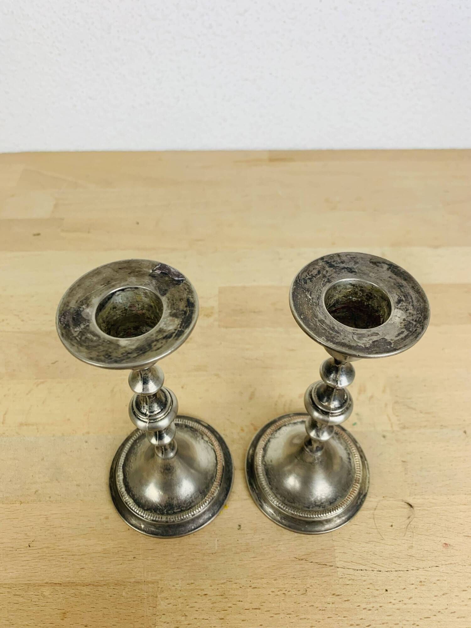 Pair of vintage silver-plated metal candlesticks