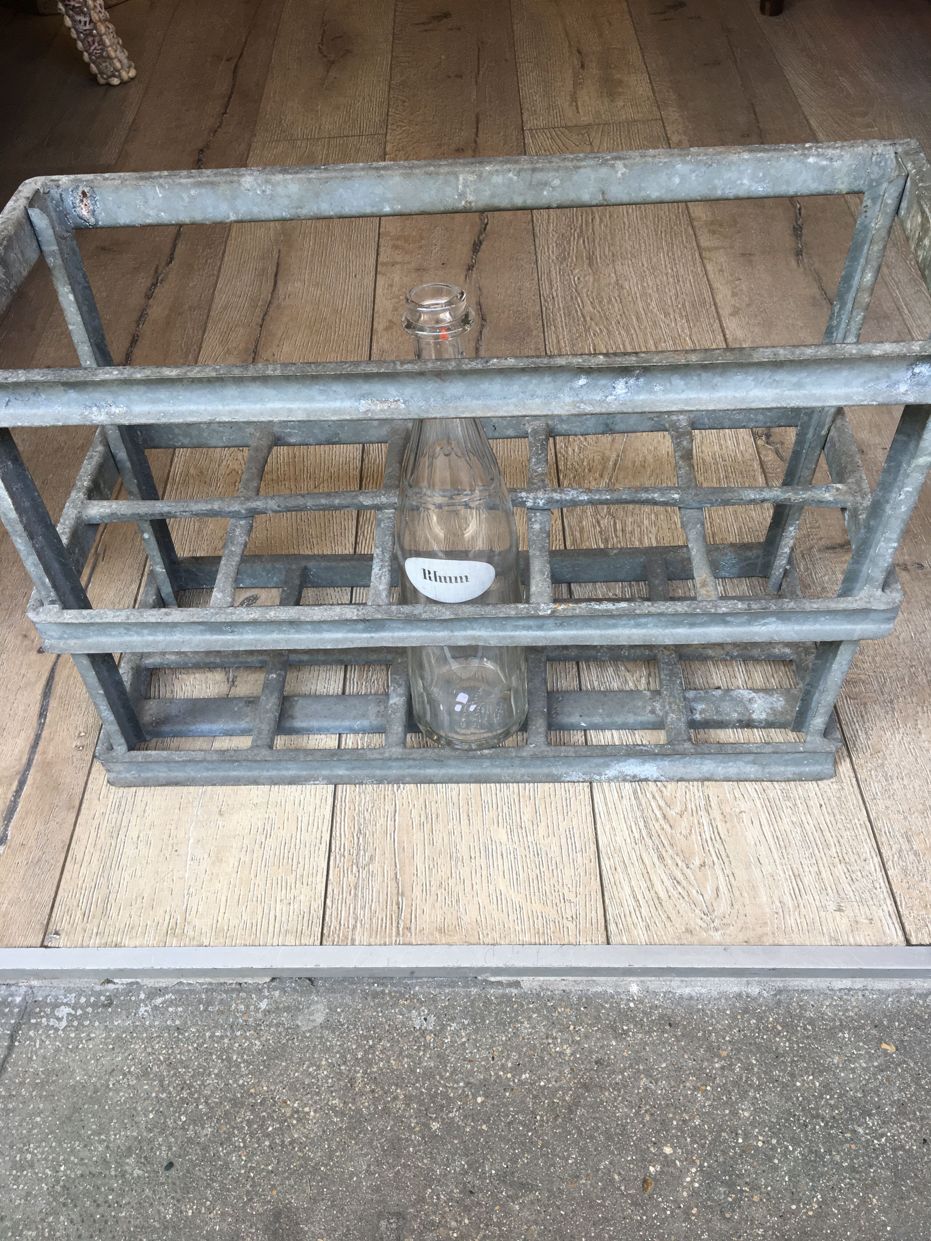 Old bottles in rectangular zinc locker