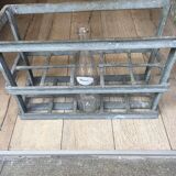 Old bottles in rectangular zinc locker