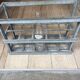 Old bottles in rectangular zinc locker