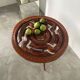 Table basse années 60 tripode bois ciselé