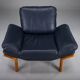 Danish teak and navy blue leather lounge chair from Komfort, 1970s