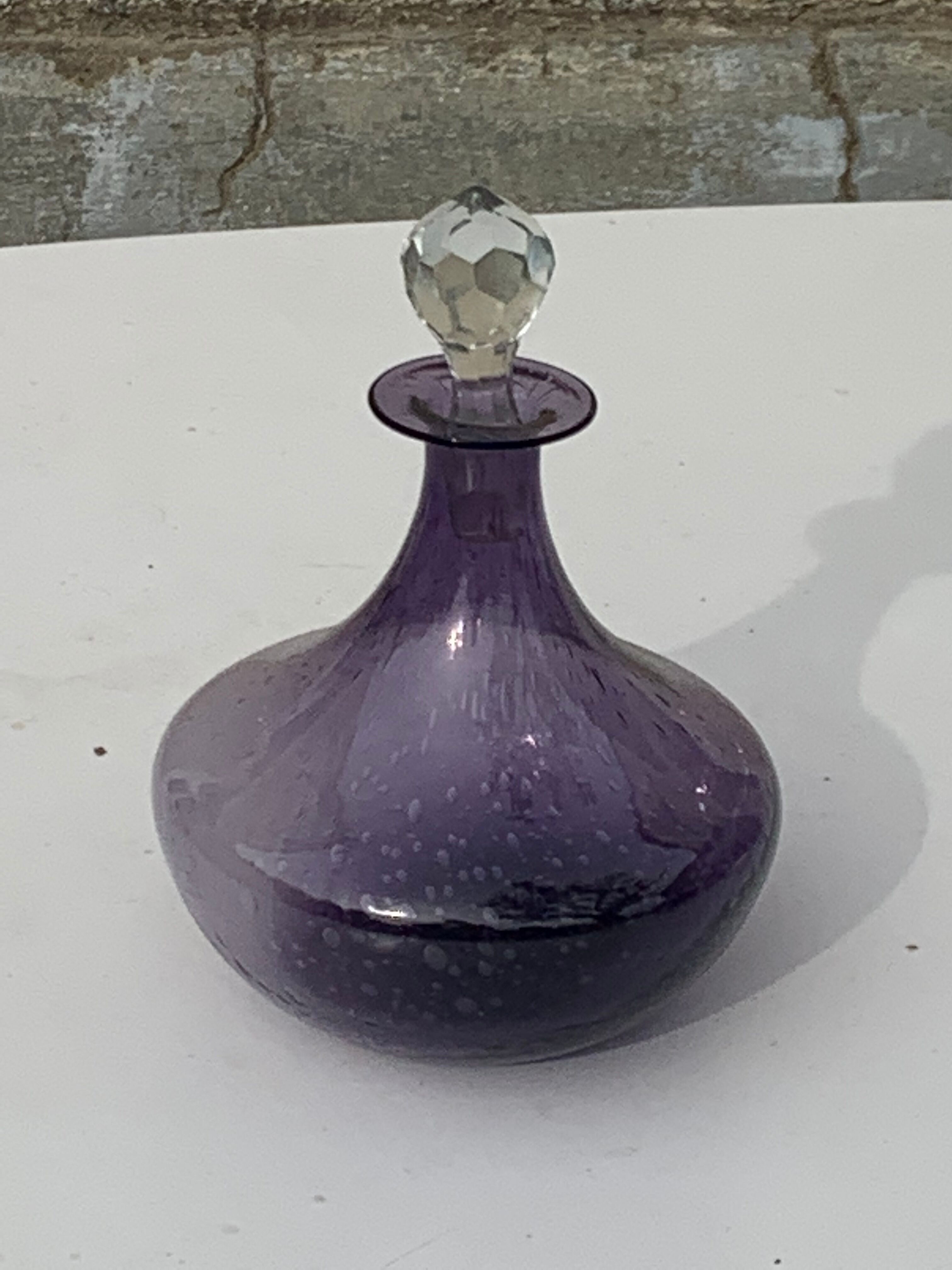 Bubble and purple blown glass decanter and faceted cut glass cap