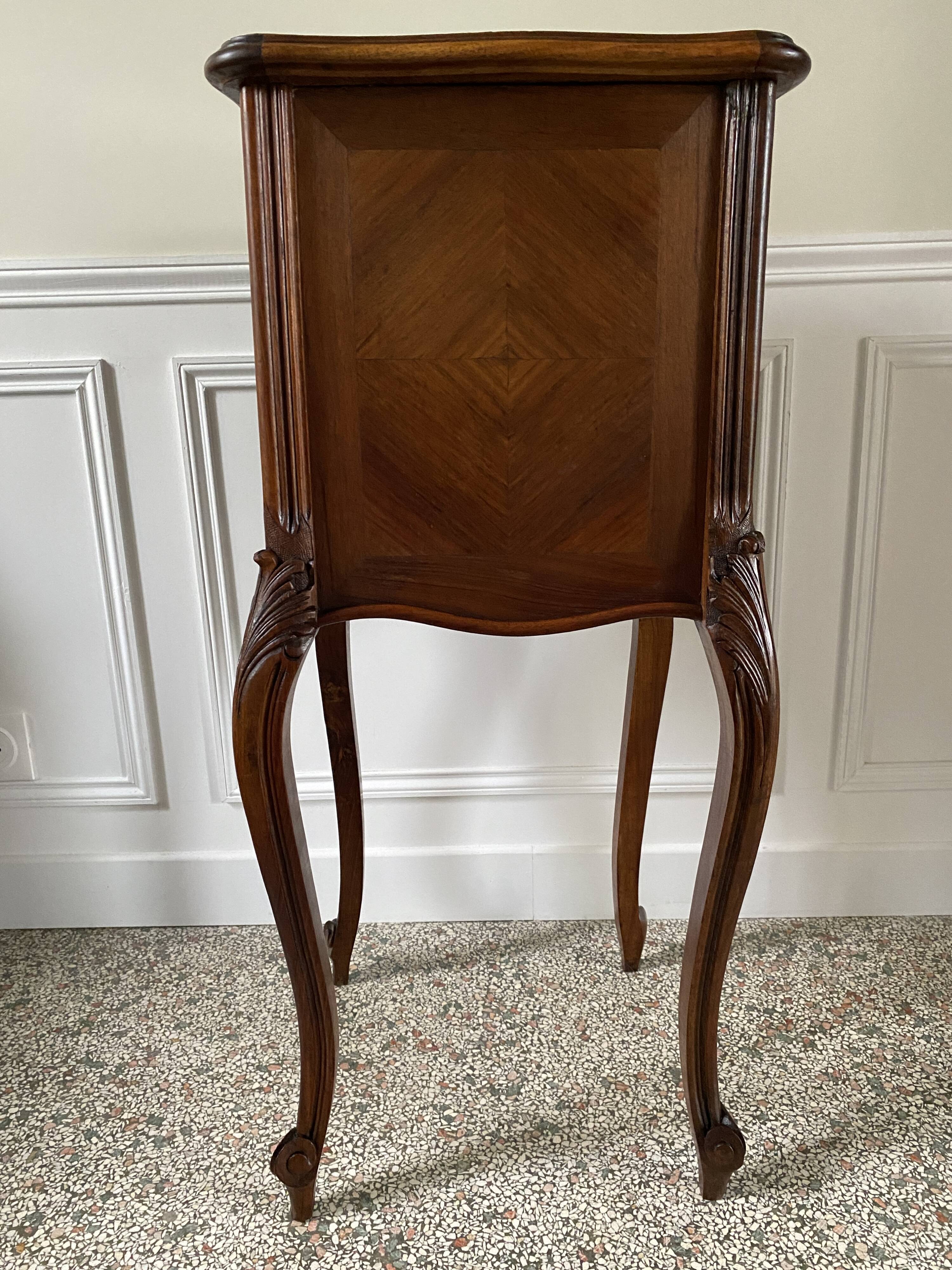 Bedside table / bedside table in veneered wood, molded and carved with foliage Louis XV style