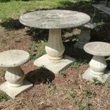 Old garden furniture in reconstituted stone