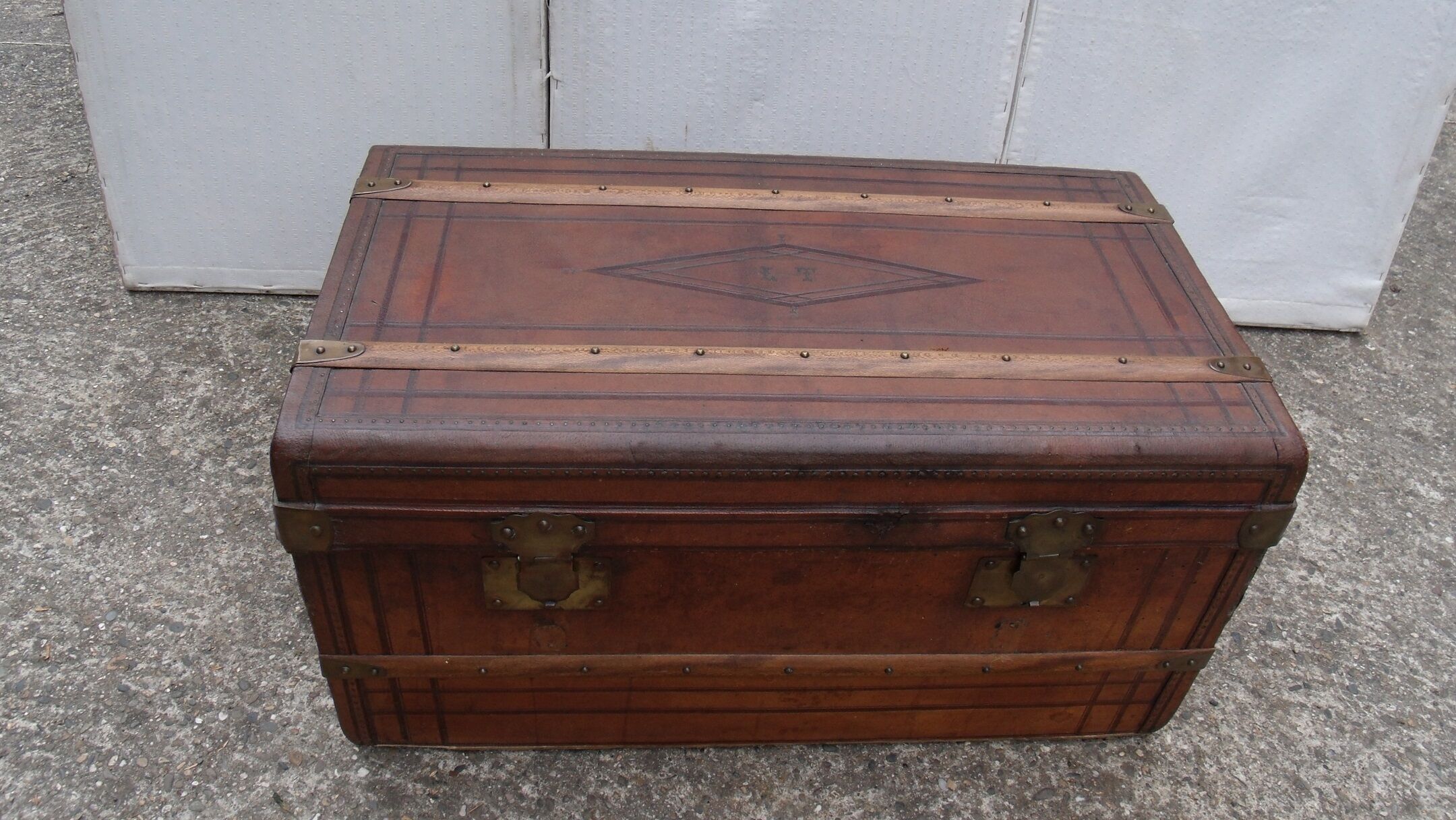 Old wooden trunk covered leather travel chest