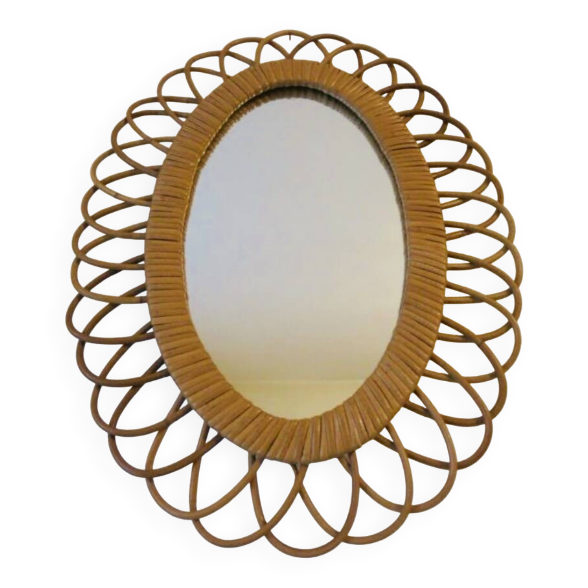 Vintage oval rattan mirror from the 60s and 70s with a rosette