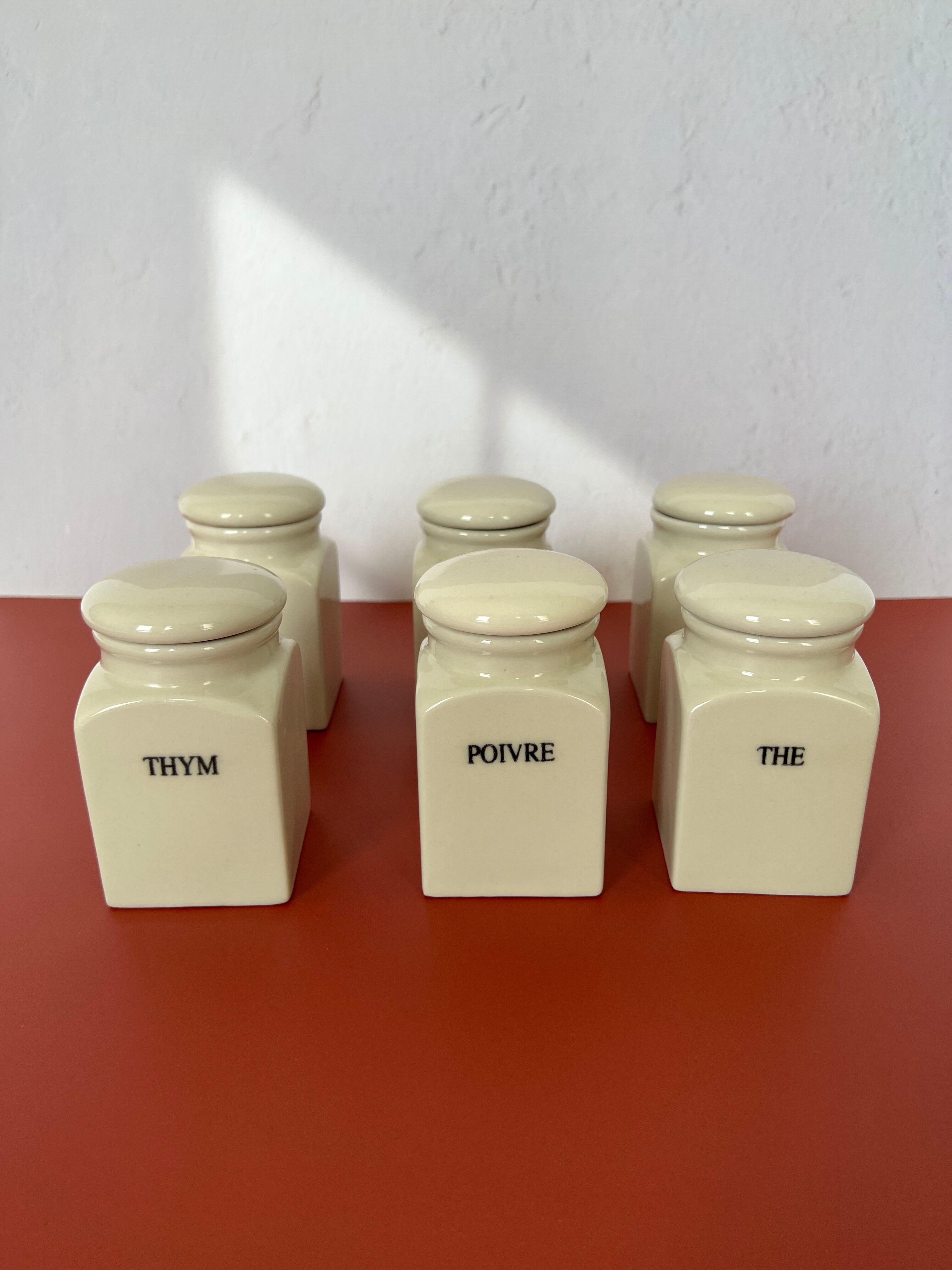 Set of vintage porcelain spice jars