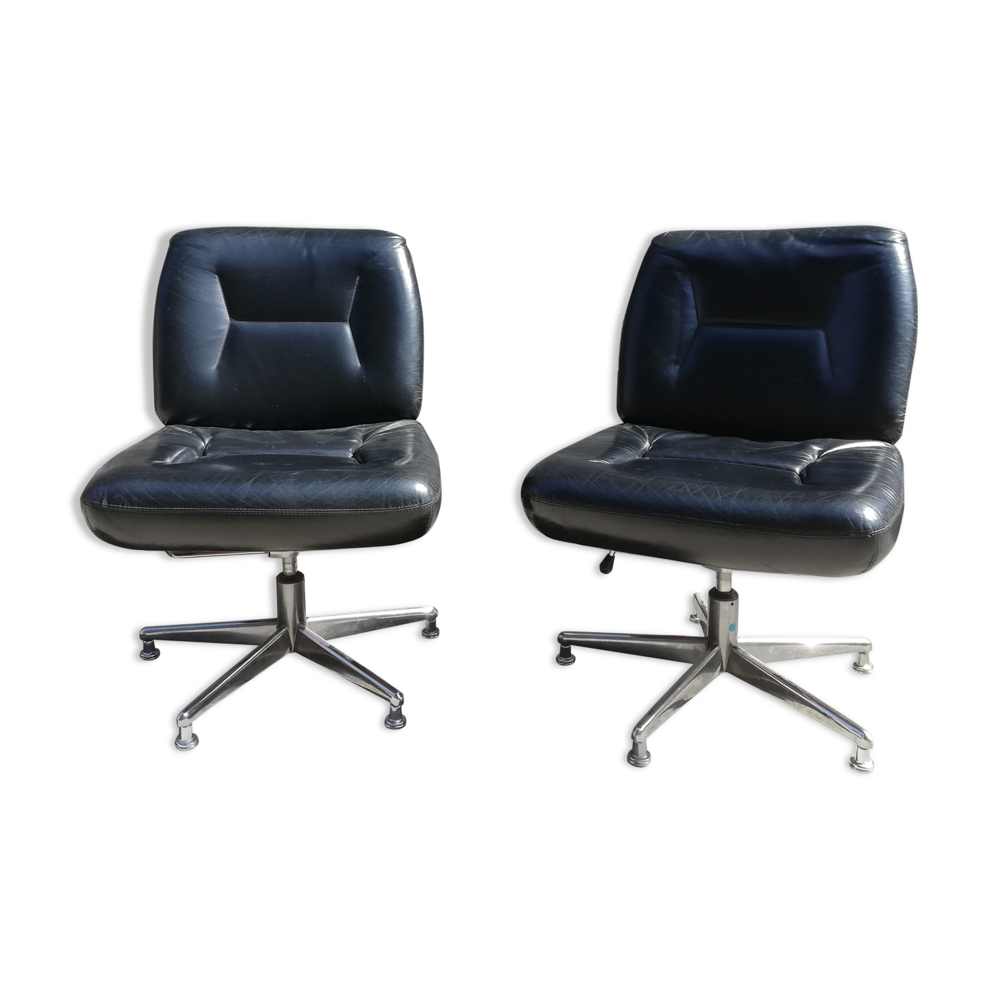 Pair of black leather office armchairs, 1970