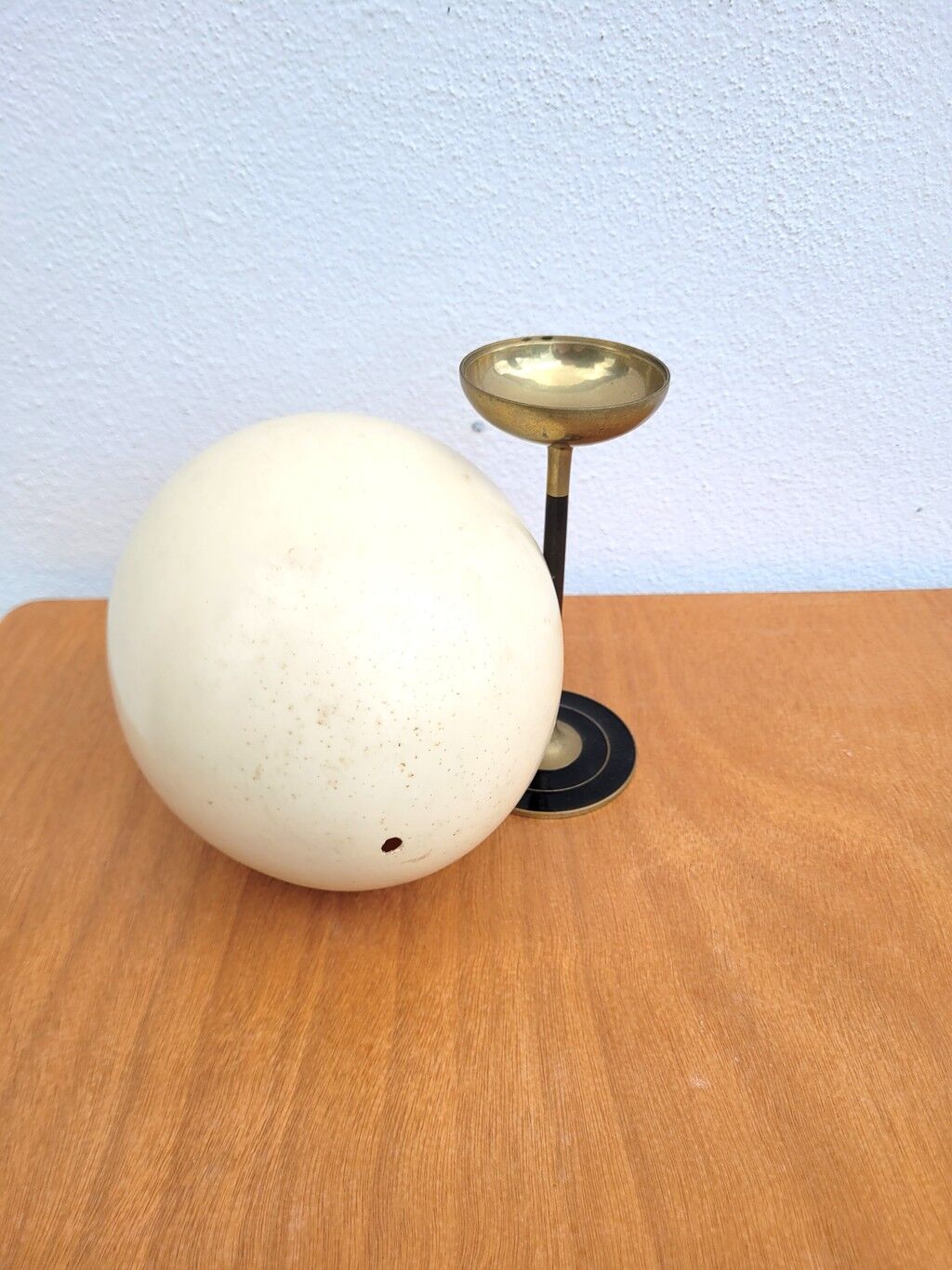 Ostrich egg on a brass stand