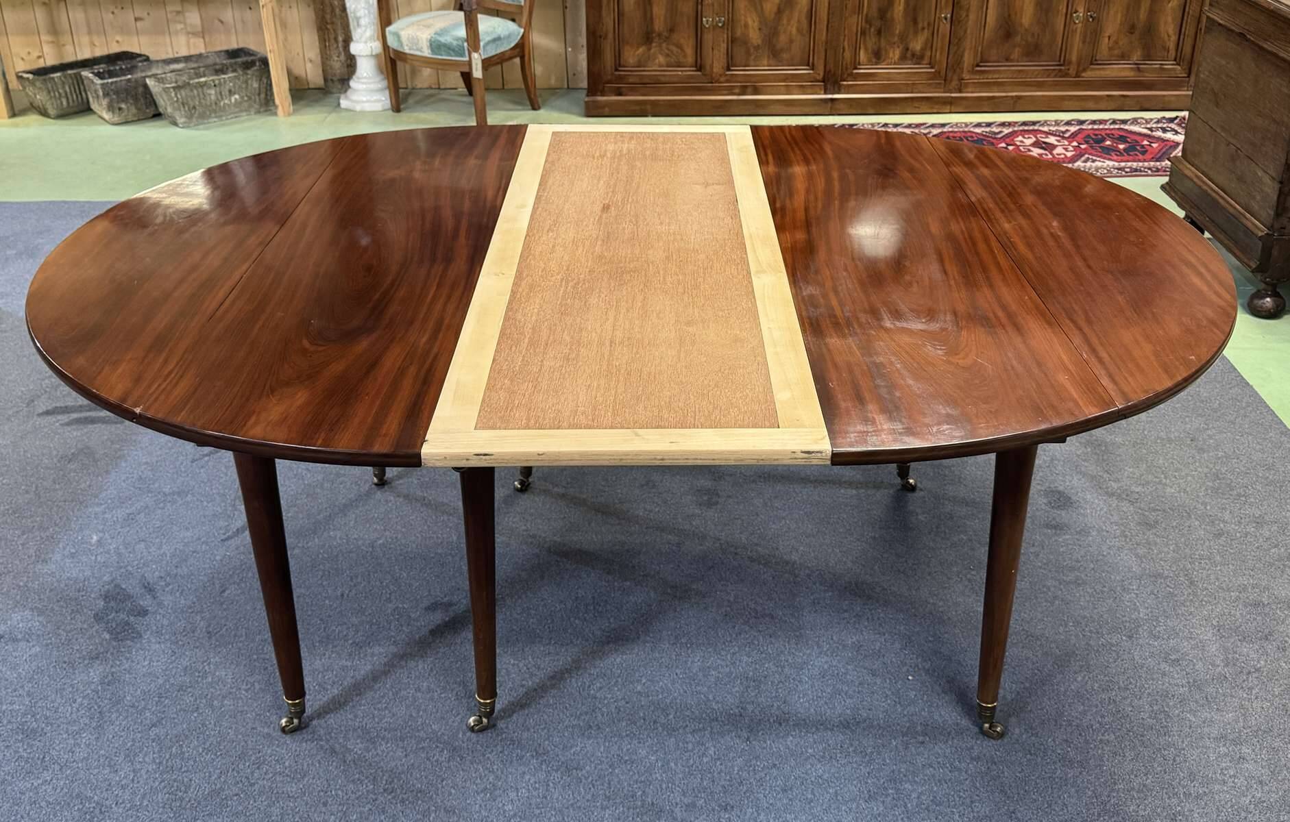 19th-century Louis XVI dining table in Cuban mahogany.
