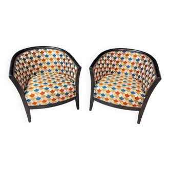 Paire de fauteuils art déco en bois laqué noir