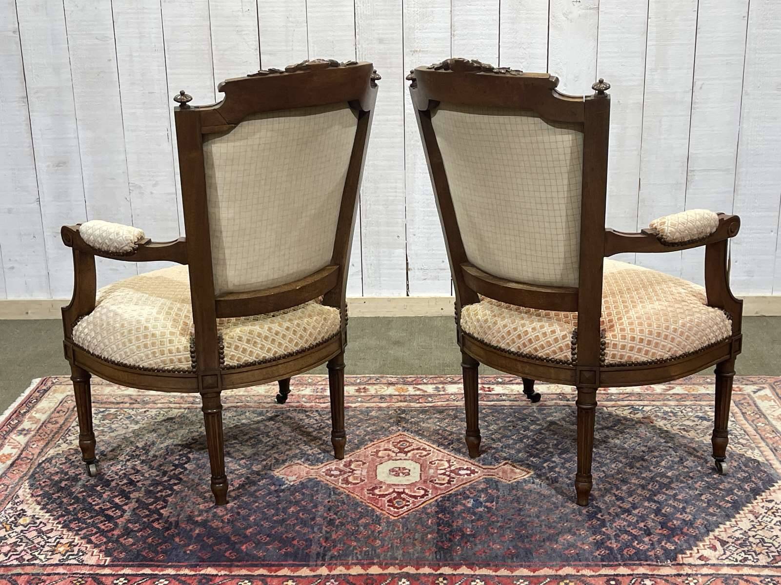 Pair of early 20th century Louis XVI armchairs in walnut