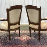 Pair of early 20th century Louis XVI armchairs in walnut
