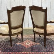 Paire de fauteuils Louis XVI début XXème en noyer