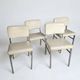 4 chrome metal chairs with faux leather from the 1970s.